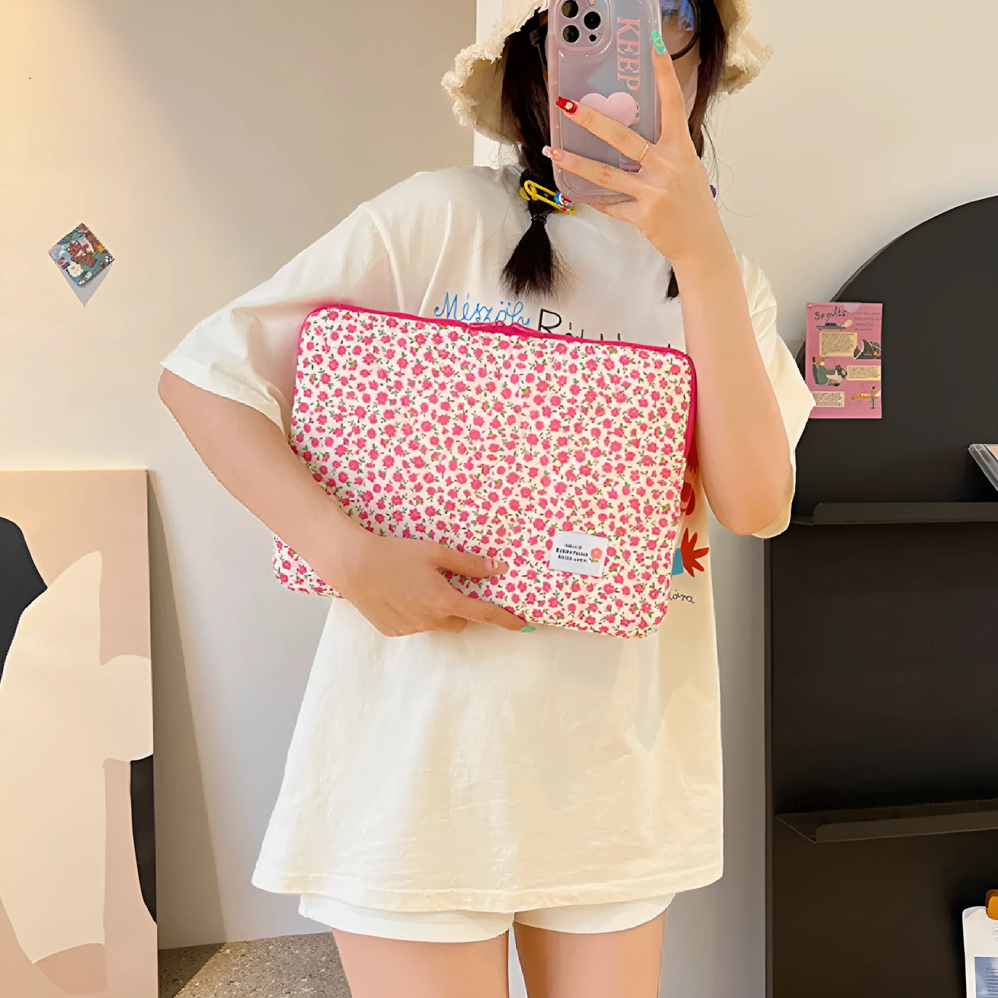 Green floral print cloth laptop bag with anti-seismic protection for 13 to 15 inch computers.