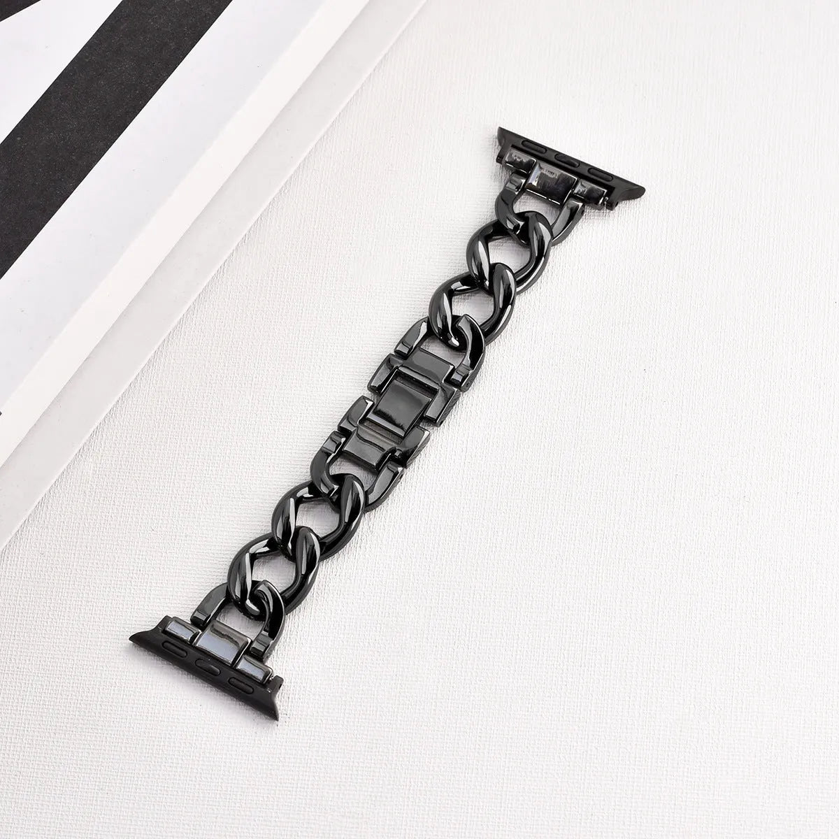 Metal denim chain design Apple Watch strap in silver, black, gold, rose gold and Starlight colours for 38mm to 49mm models.
