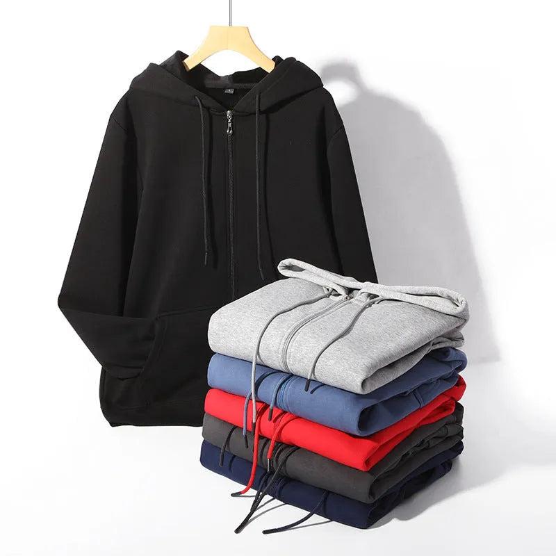 Man wearing a beige heavyweight cotton zipper hoodie with a hood and front pockets, showing loose fit.