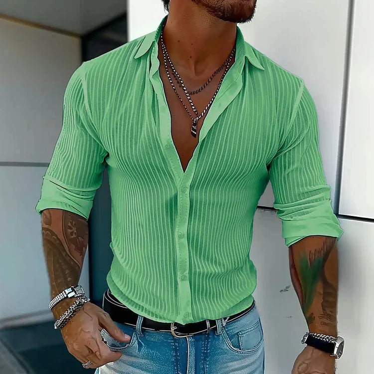 A man's loose-fit striped cardigan shirt with long sleeves in a British style design.