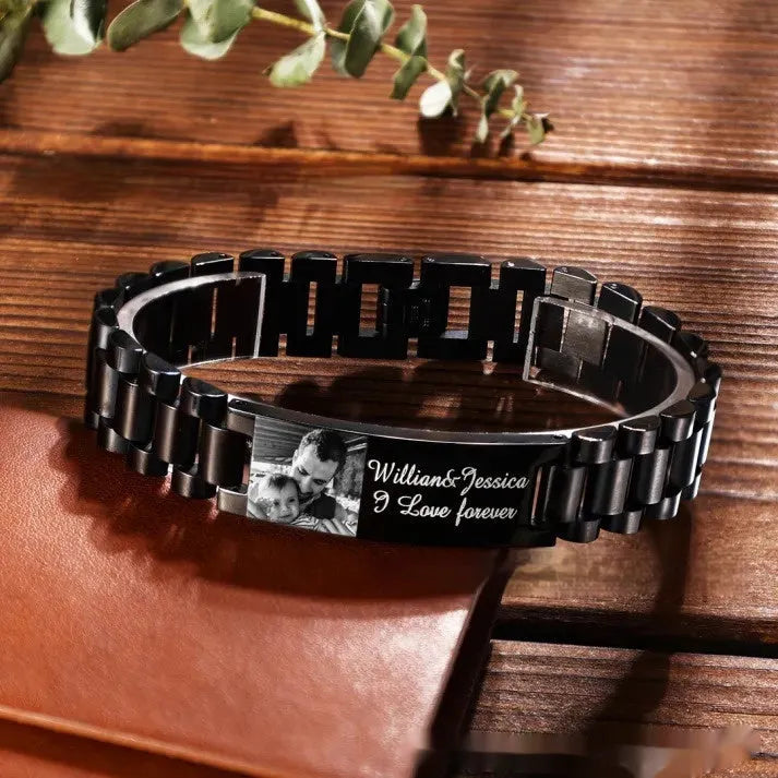 Men's stainless steel bracelet with curved heart design and black lettering in gift box