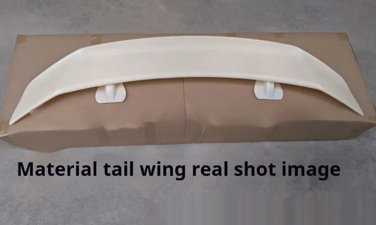 Universal punch-free car spoiler tail wing in ABS plastic, shown in bright black finish.