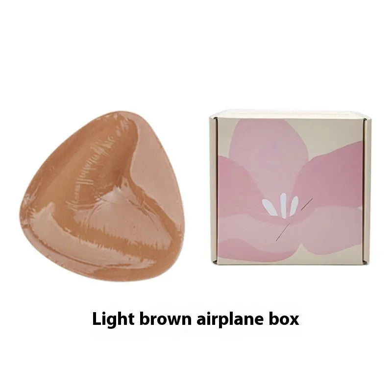Double sided adhesive silicone bra inserts for push up lift in nude shades, reusable and water resistant