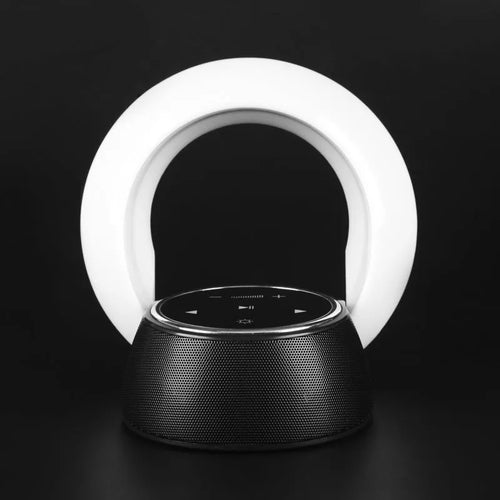 Square blue Bluetooth speaker lamp with touch controls, showing white LED light and folding design.