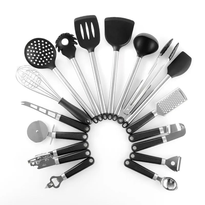 Black silicone kitchen utensil set with stainless steel handles showing four different utensil types