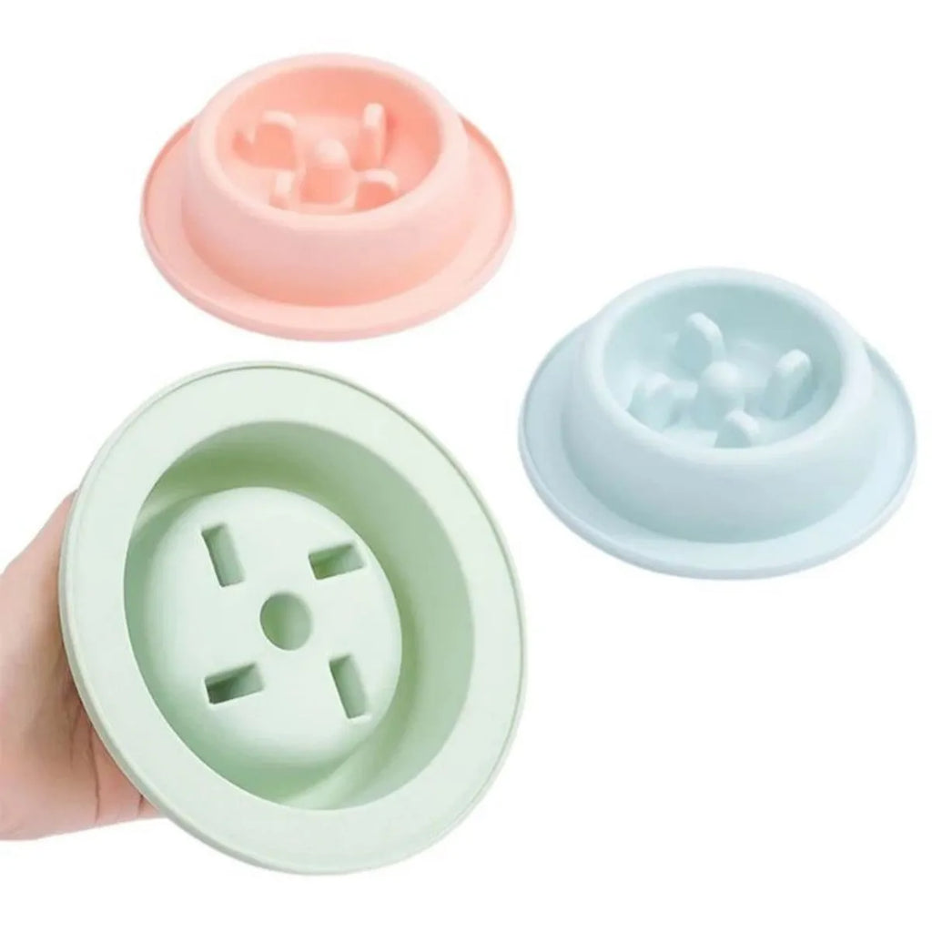 Pet slow eating feeder bowl in blue PP plastic with raised internal sections and non-slip base