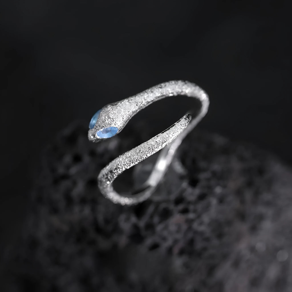 Adjustable silver snake ring with electroplated platinum colour finish and zodiac design