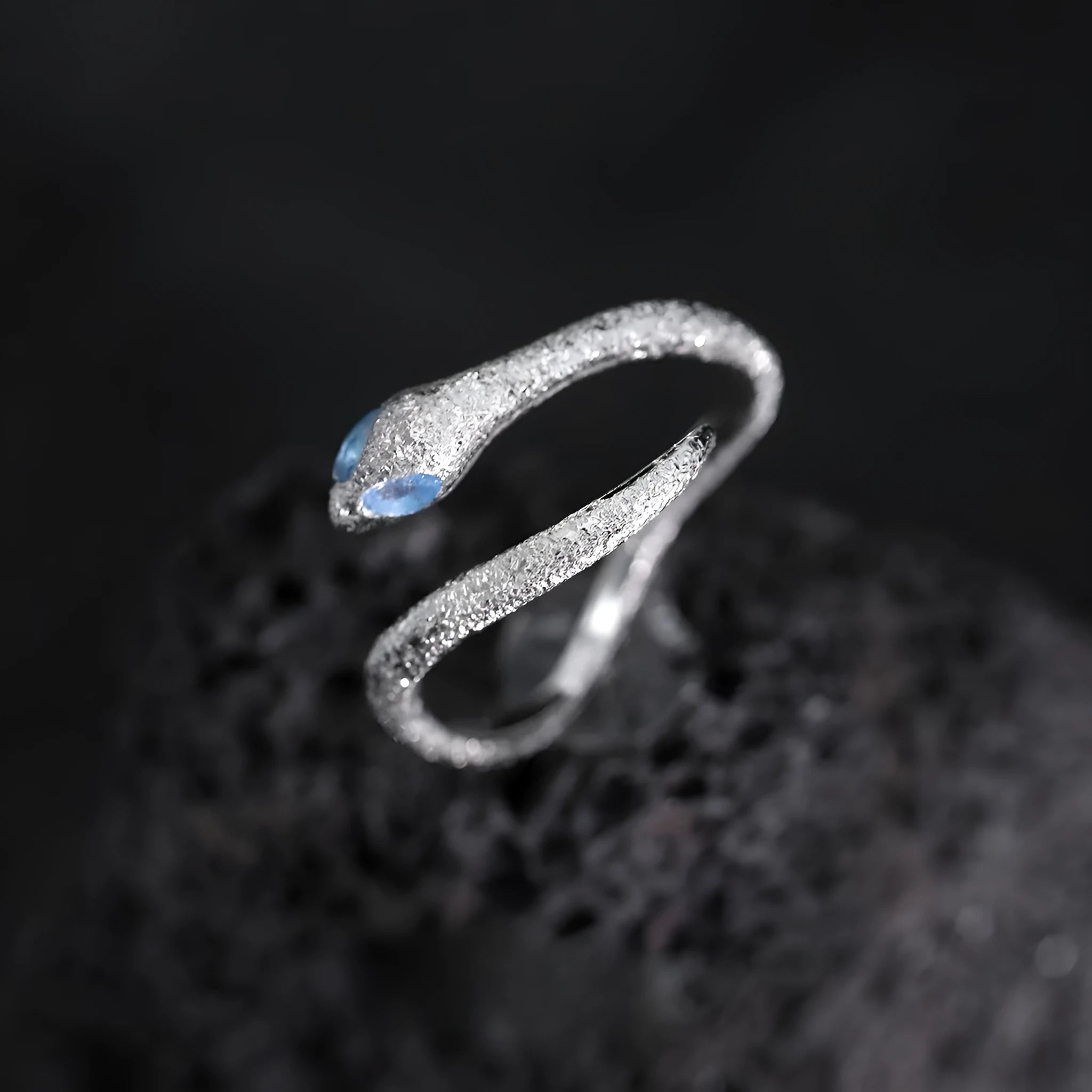 Adjustable silver snake ring with electroplated platinum colour finish and zodiac design