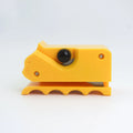 Colourful cartoon cat-shaped cutter for cutting corrugated paper to make scratch boards.