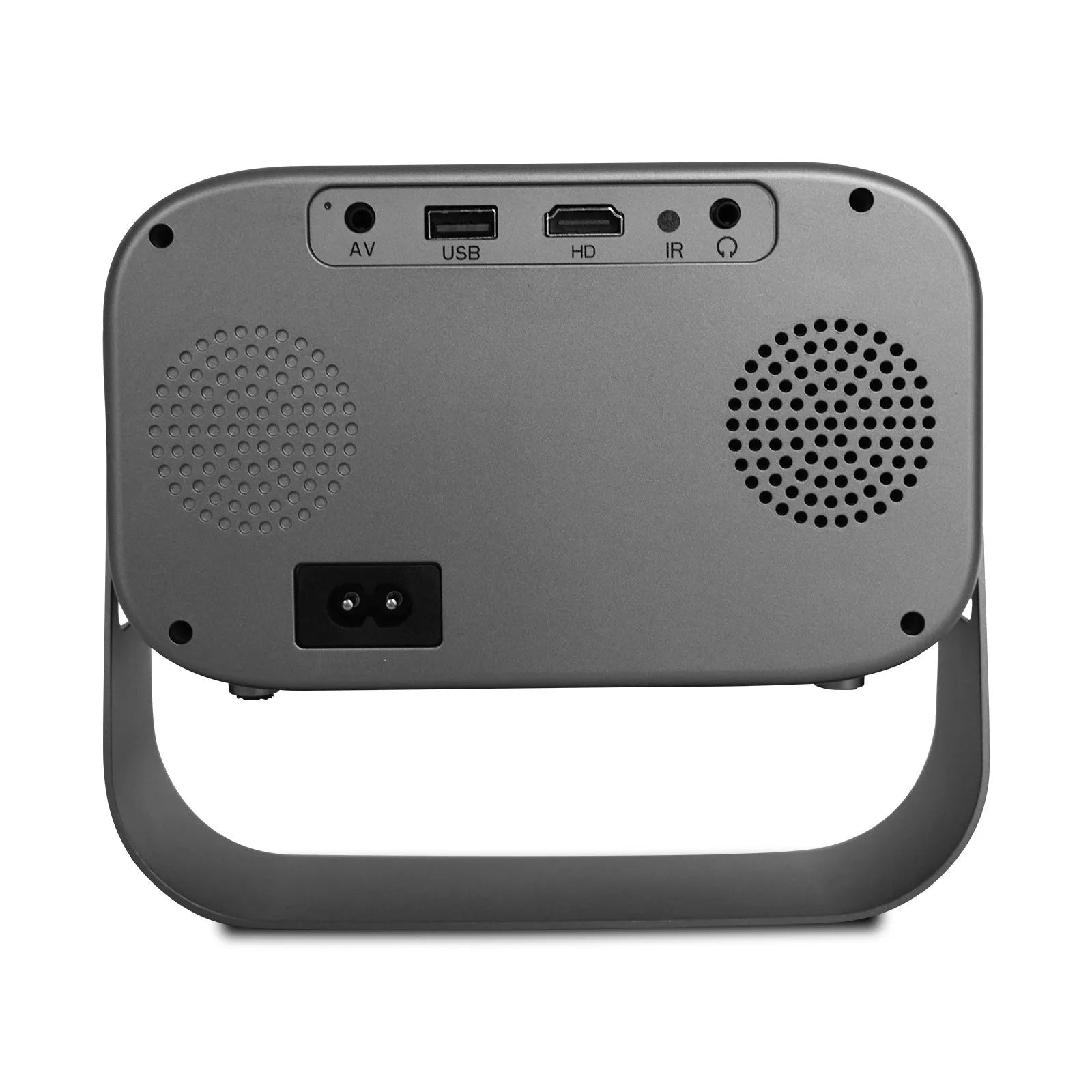 Black portable smart HD projector with remote control on a desk.
