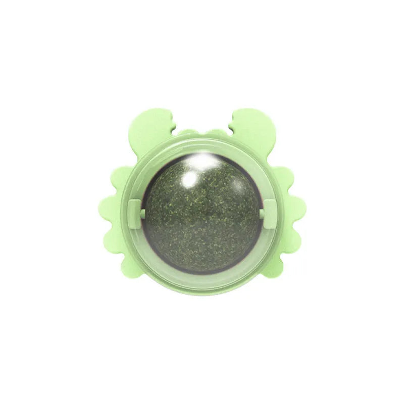 Catnip wall ball toy with three removable catnip balls in a wall-mounted rotatable holder, shown in Blue, Green and Pink.