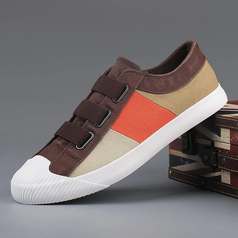 Men's low-top canvas sneakers with elastic band closure and flat rubber soles