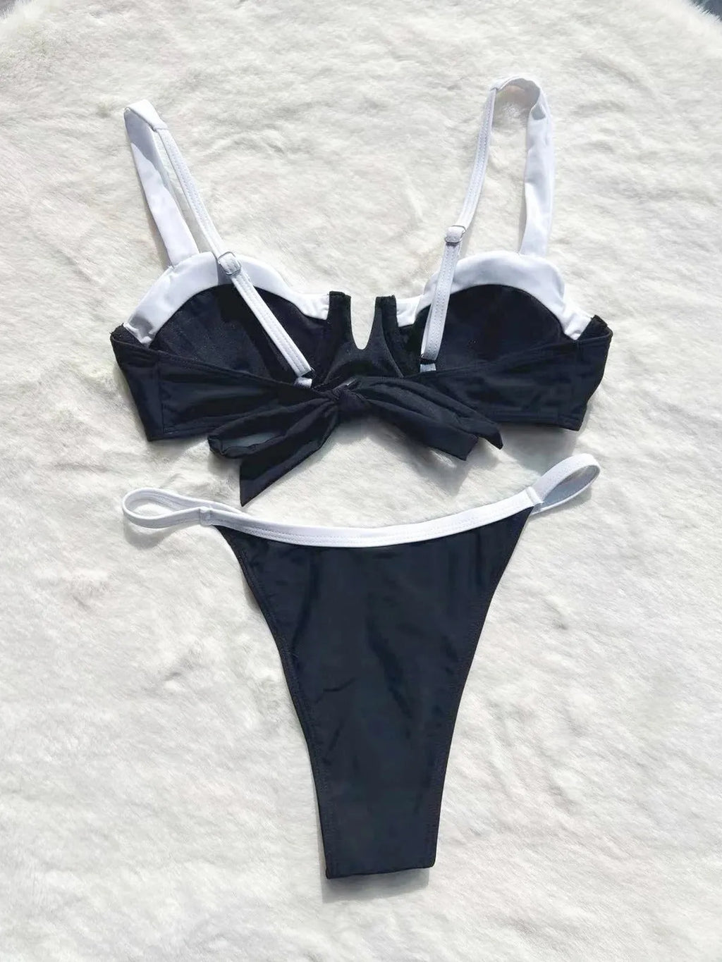 Black low waist women's bikini swimsuit with stitching split design detail