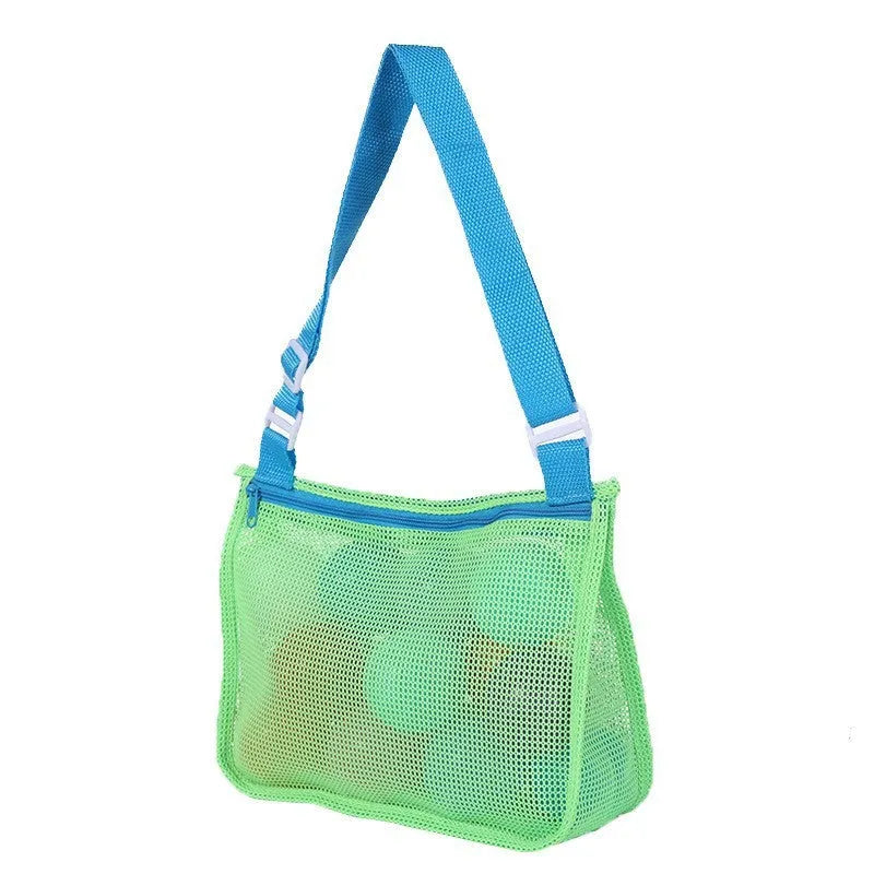 Blue nylon mesh travel storage bag with black handle and zip seal for children's clothing organisation