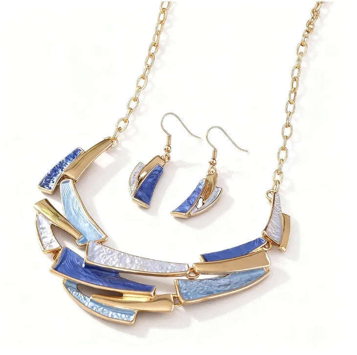 Blue zinc alloy bohemian necklace and earring set with irregular quadrilateral pendants on a light surface