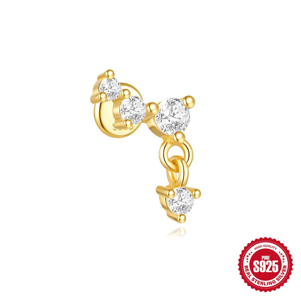 S925 sterling silver geometric moon and star earrings with diamond detail on a gold tone background.
