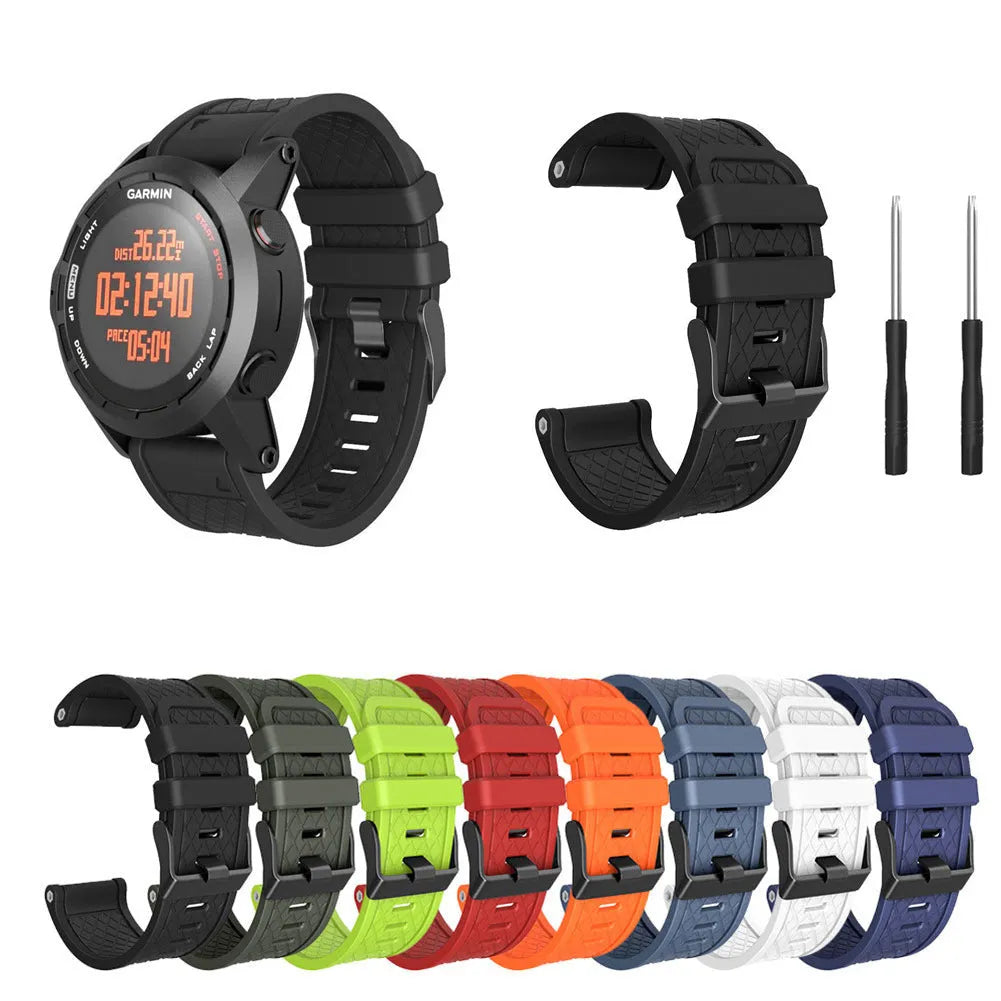 Black silicone Jiaming watch strap with stainless steel button showing 26mm width measurement