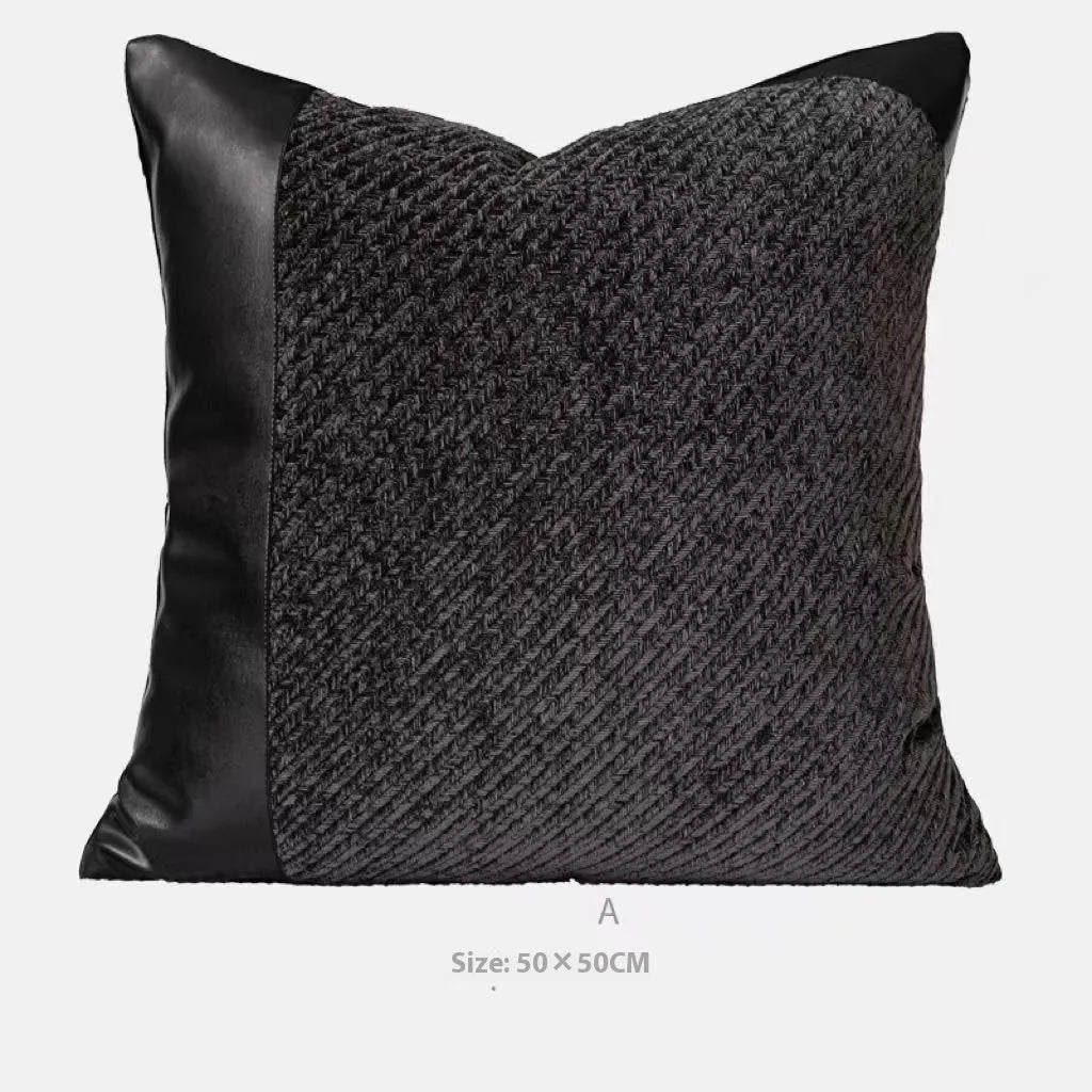 Modern minimalist grey and white plaid polyester bed runner with dark grey pillowcase and round leather pillow on bed
