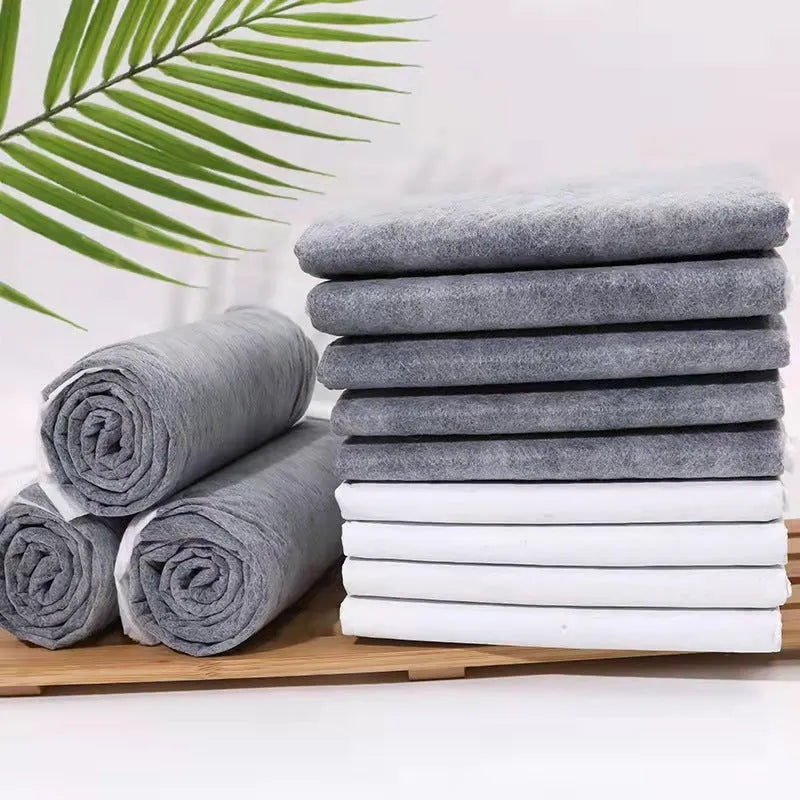Pack of pet urinal pads showing bamboo charcoal deodorant variant in size L 60x60cm