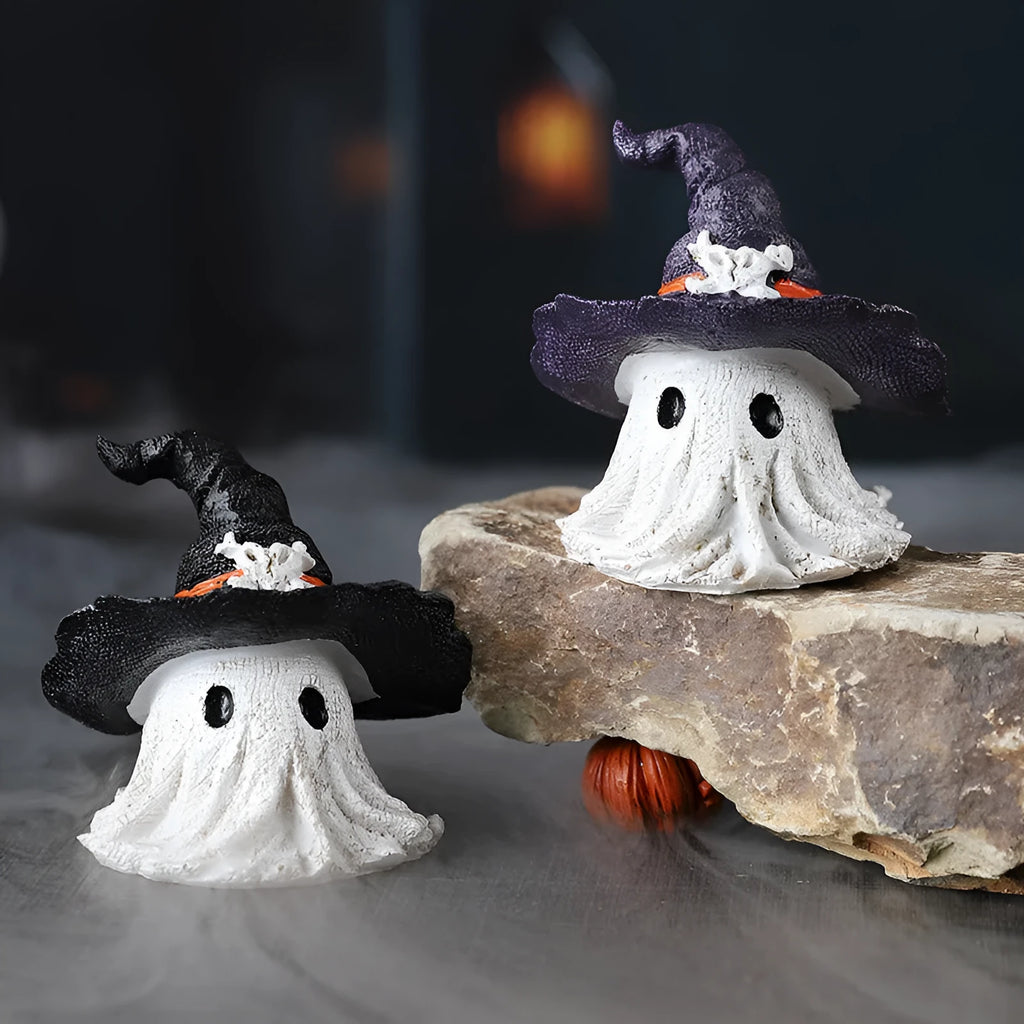 A purple and a black solid resin wizard hat ornament for holiday decoration.