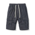 Korean-style men's multi-pocket loose cropped shorts in black for summer outdoor leisure