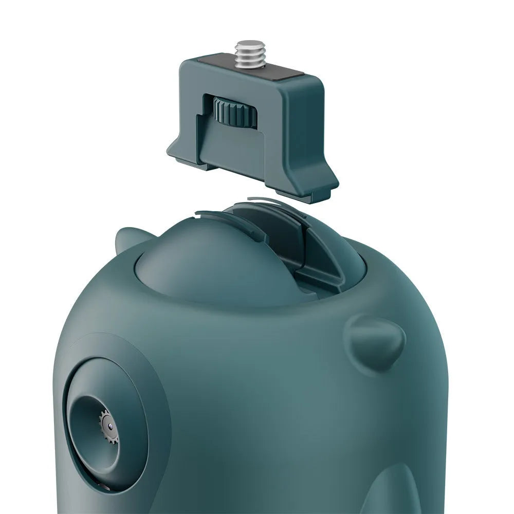 Dark green intelligent AI face recognition gimbal with 360-degree rotation on a desk.