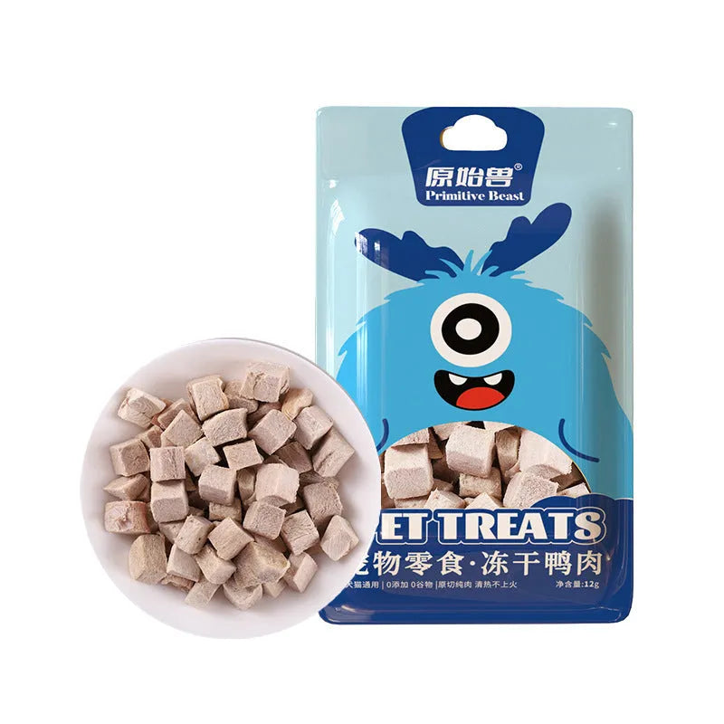 Assorted freeze-dried pet snacks including chicken, salmon and egg yolk flavours in small resealable bags.