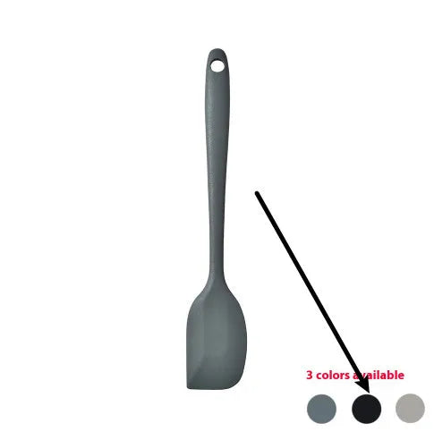 Black silicone kitchen utensil set with 12 tools stored in a rotating plastic storage bucket on a worktop.
