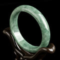 Natural emerald bean green simple beaded bracelet for women on a gift box.