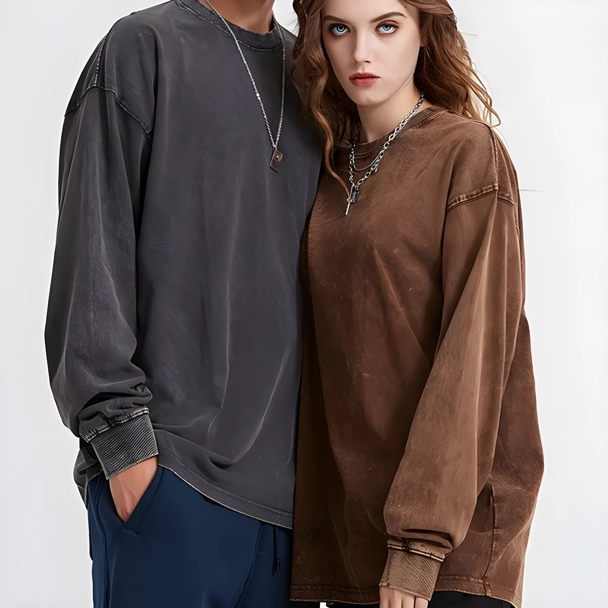 Man wearing a vintage washed batik colour cotton long sleeve pullover in a loose fit.