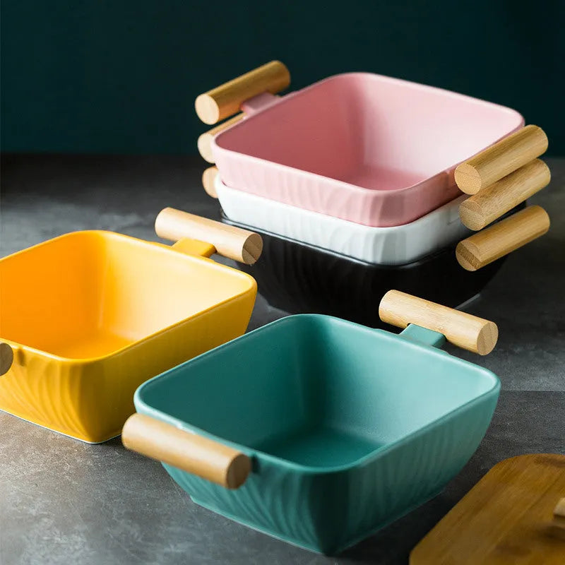 Modern irregular-shaped porcelain bowl with lid in black, green, pink, or white.