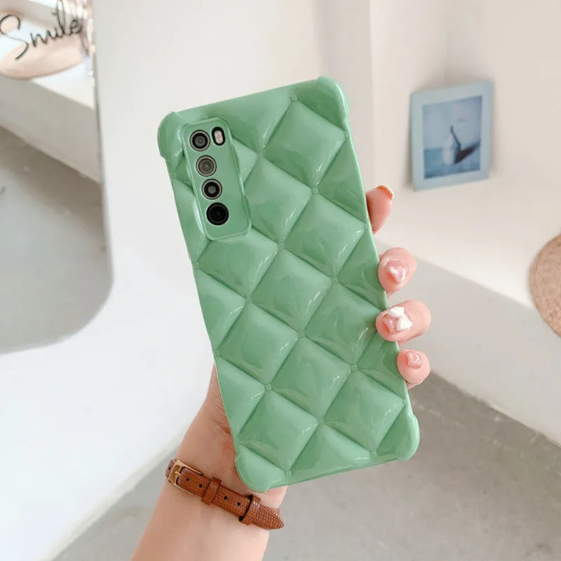 A solid-colour silicone back cover case for Huawei smartphones on a table.