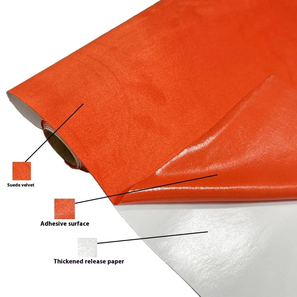 Roll of self-adhesive leather suede fabric in BMW brown colour next to a car dashboard.