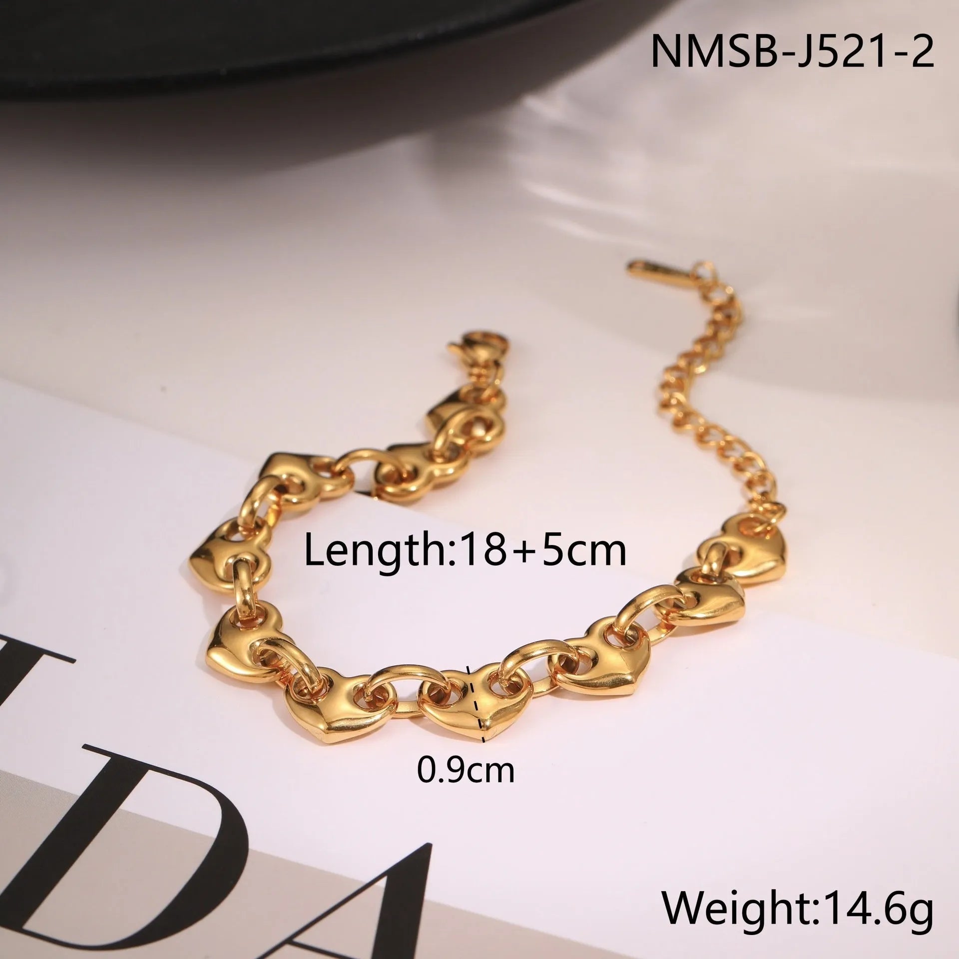 18K stainless steel hollow heart bracelet for women in gold, steel, or colour-blocked finish.