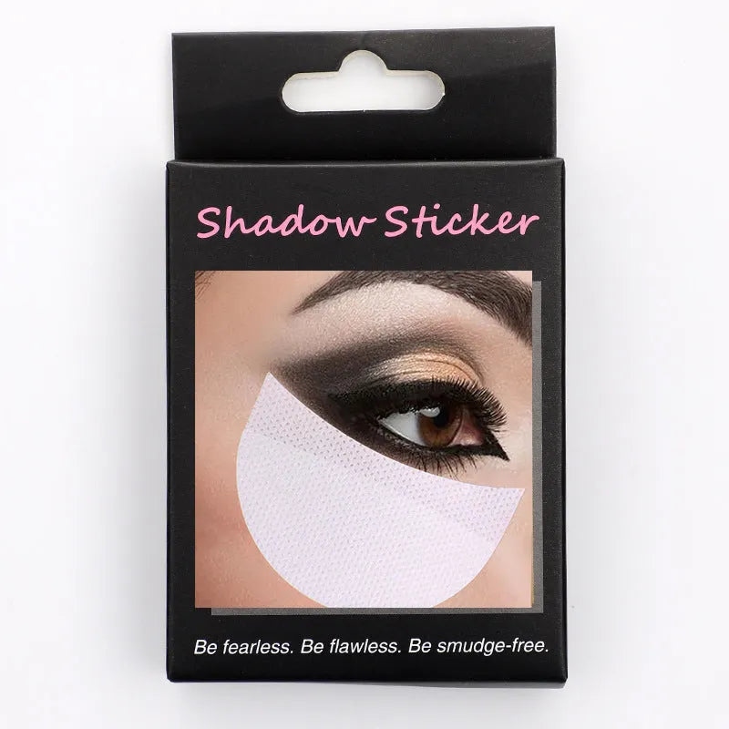 Half moon shaped disposable eyeshadow shields on a white background.