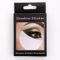 Half moon shaped disposable eyeshadow shields on a white background.