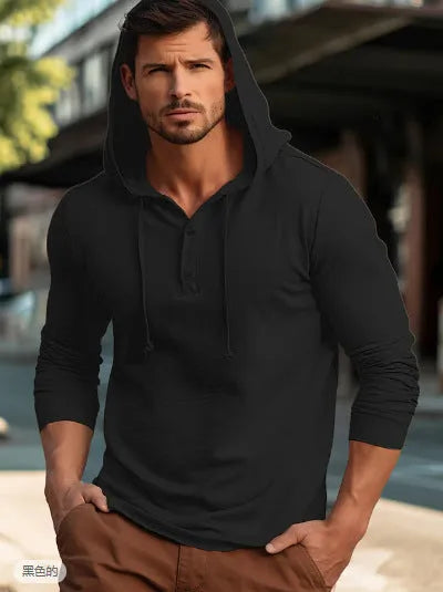 A dark blue cotton pullover hoodie with long sleeves on a hanger.