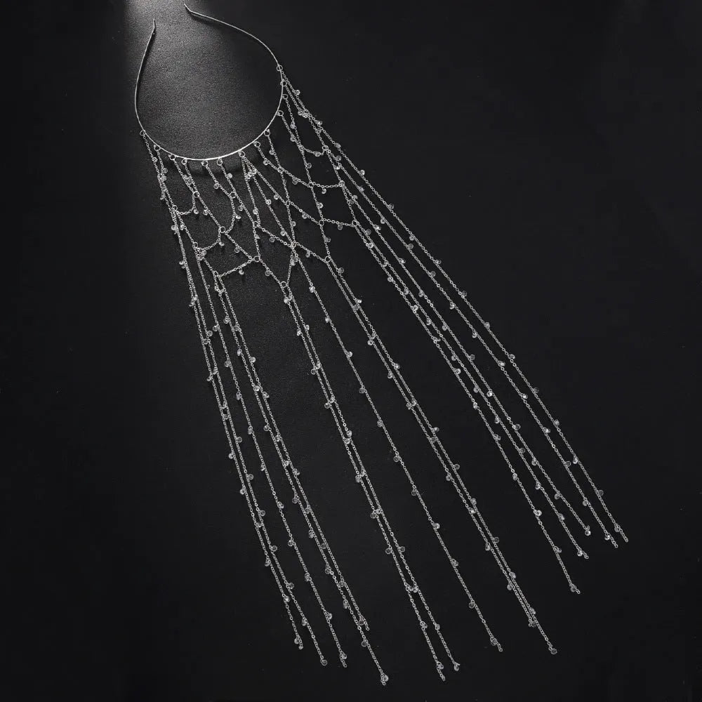 Gold electroplated rhinestone mesh headband with dangling tassel decorative elements
