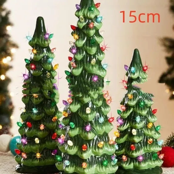 Set of three resin Christmas tree decorations in 20cm, 25cm, and 30cm sizes with LED lights.
