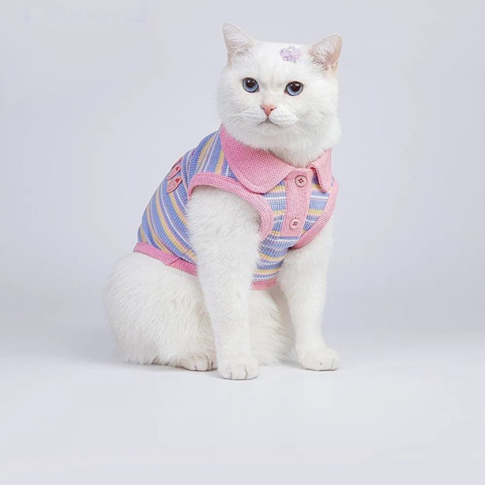 Pink purple knitted fleece vest for a small dog on a white background.