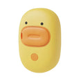 White and yellow rechargeable pet steam brush with silicone comb teeth for grooming dogs and cats.