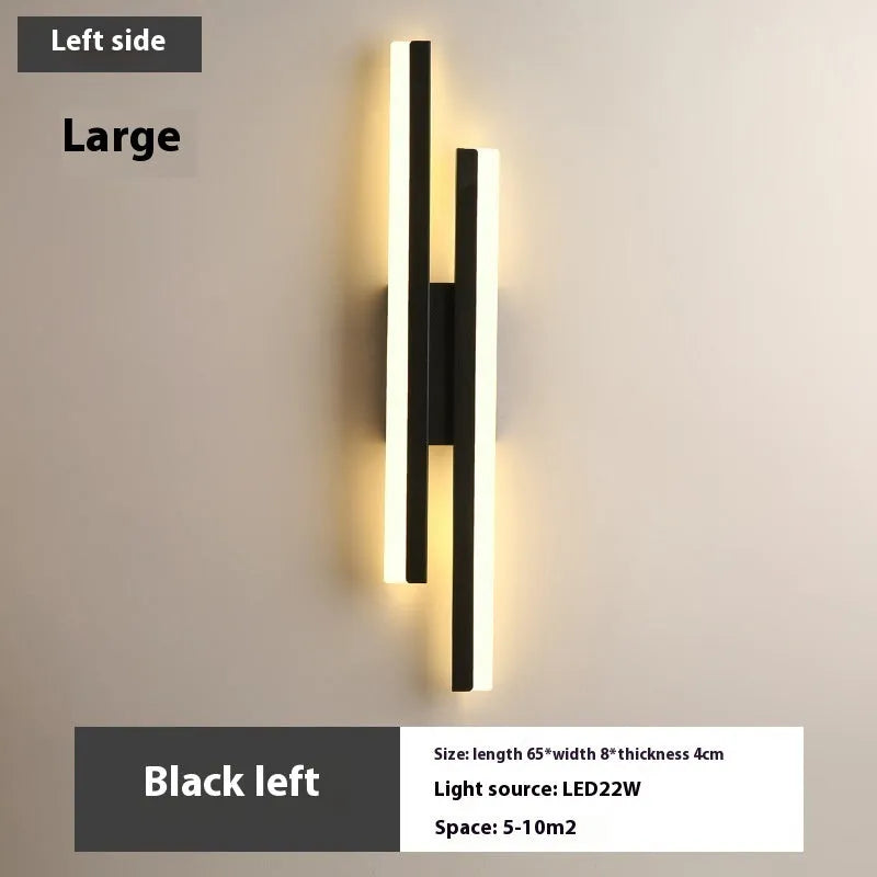 Minimalist Scandinavian-style LED wall light with acrylic shade in black or gold finish