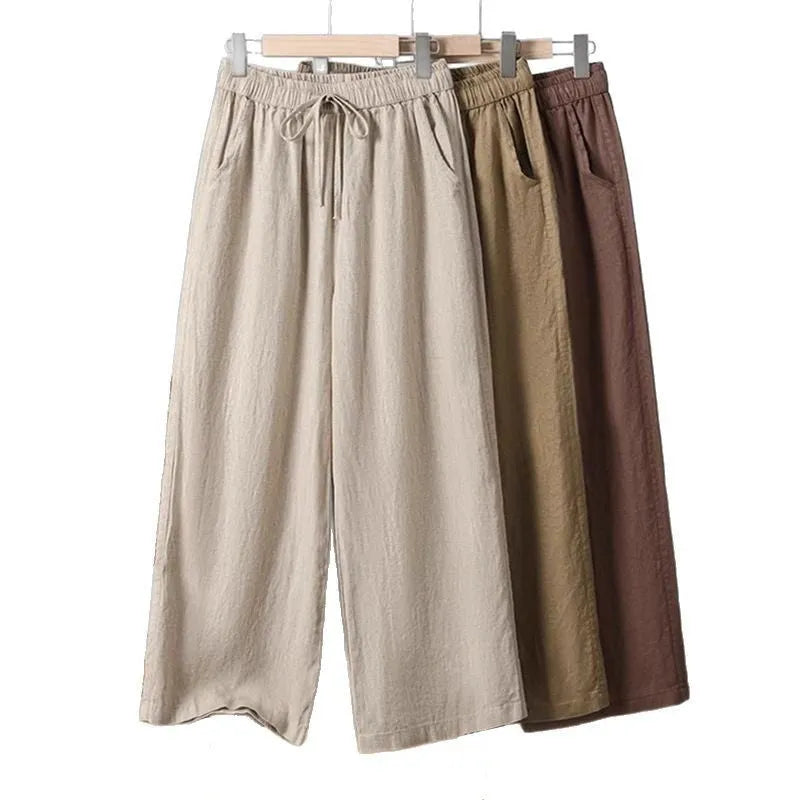 Women's straight-leg casual trousers with elastic waist and drawstring detail in apricot colour