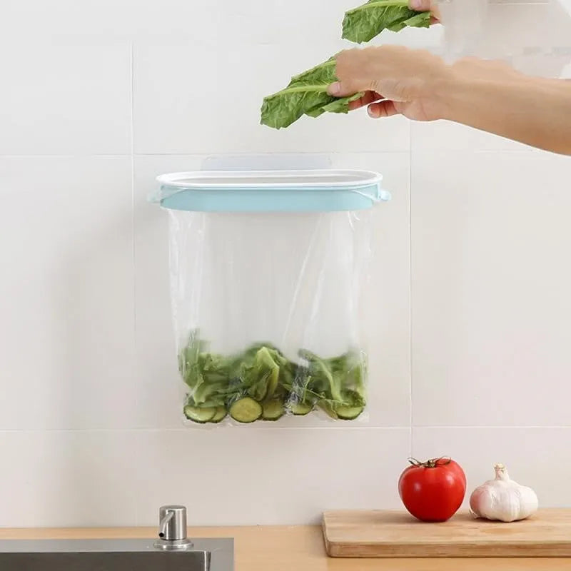 Blue plastic kitchen rubbish bag storage rack designed for under-cabinet mounting.