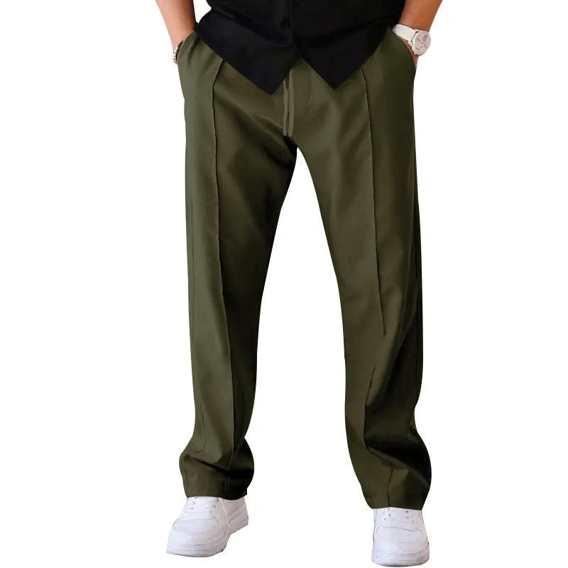 Men's loose straight trousers in waffle polyester with drawstring, available in multiple colours including black and light grey