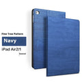 Sapphire blue imitation leather sleep bracket cover for Apple iPad models on a table.