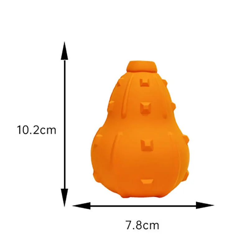 Natural rubber stuffable dog fetch toy with longer strap for small to medium breed dogs.