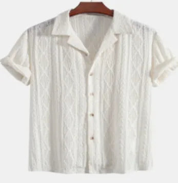 A man wearing a loose-fitting, solid-colour short-sleeve cardigan suitable for summer.