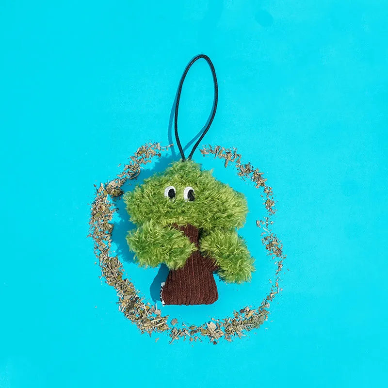 Pine tree shaped plush cat hanging toy with mint filling measuring 10cm by 12cm