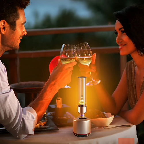White silver candlelight Bluetooth speaker and LED atmosphere light on a table.